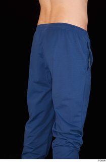 Hamza blue jogging pants dressed thigh 0006.jpg